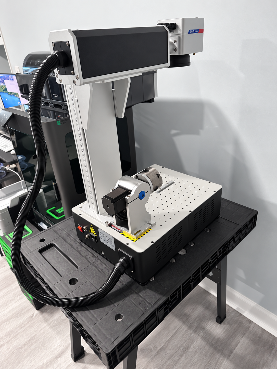 Laser workstation with rotary chuck, retouched for presentation